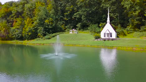 Aerial-over-a-romantic-and-beautiful-small-church-in-the-American-wilderness-West-Virginia-4