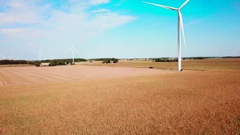 Rising-aerial-of-a-wind-turbine-producing-alternative-electricity-in-rural-Michigan