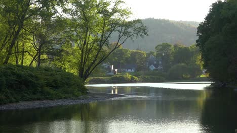 A-quaint-rural-scene-beside-a-lake-or-river-in-New-England