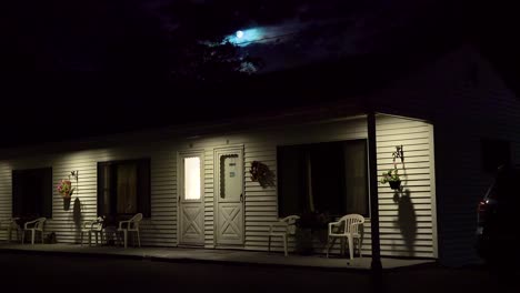 Establishing-shot-of-a-roadside-motel-under-a-full-moon-at-night-4