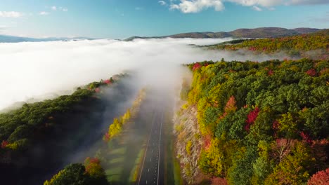 Beautiful-vista-aérea-over-a-highway-through-the-fog-in-fall-in-New-England-1