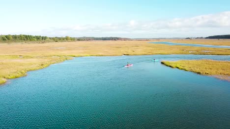 Aerial-over-kayakers-rowing-through-vast-bogs-along-the-Nonesuch-River-near-Portland-Maine-New-England-1