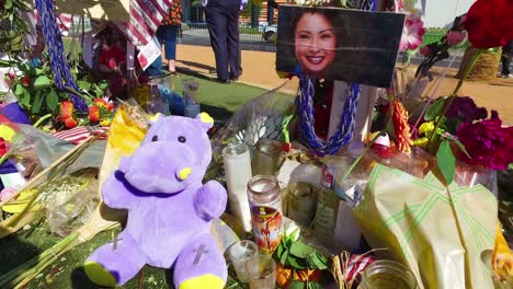 2017---thousands-of-candles-and-signs-form-a-makeshift-memorial-at-the-base-of-the-Welcome-to-Las-Vegas-sign-following-Americas-worst-mass-shooting-22