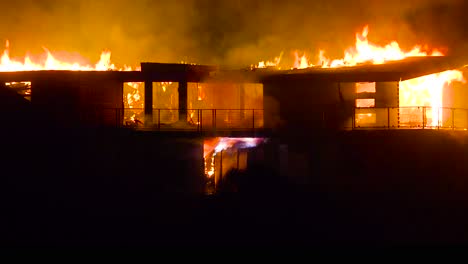 A-large-home-burns-at-night-during-the-2017-Thomas-fire-in-Ventura-County-California-2