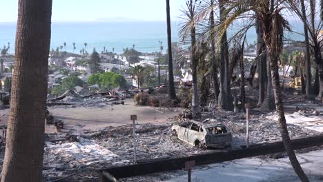 The-destroyed-remains-of-a-vast-apartment-complex-and-charred-vehicles-overlooking-the-city-of-Ventura-following-the-2017-Thomas-fire-3