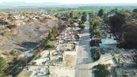 Aerial-over-entire-street-of-hillside-homes-destroyed-by-fire-in-Ventura-California-following-the-Thomas-wildfire-in-2017-10