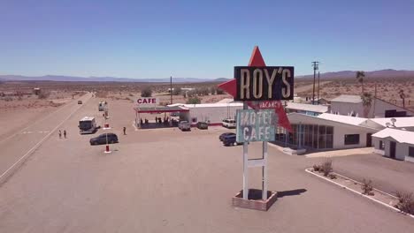 Drone-aerial-over-a-lonely-desert-gas-station-and-hotel-motel-cafe-in-the-Mojave-Desert-1