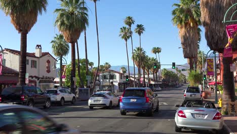 Good-establishing-shot-of-Palm-Canyon-Drive-and-traffic-in-downtown-Palm-Springs-California