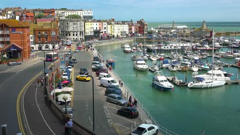 The-pretty-harbor-with-promenade-and-boats-in-Ramsgate-in-Kent-England-1