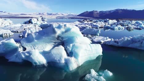 Beautiful-aerial-over-icebergs-in-the-Arctic-Jokulsarlon-glacier-lagoon-in-Iceland-8