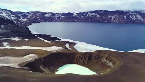 Beautiful-aerial-over-a-massive-caldera-in-the-Askja-region-of-Iceland-desolate-highlands-5