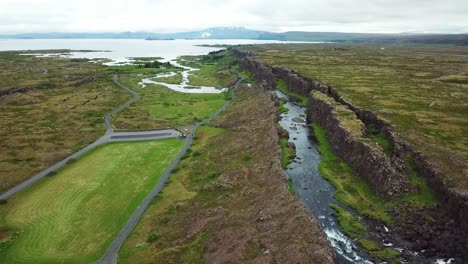 Beautiful-aerial-of-the-mid-Atlantic-ridge-running-through-Thingvellir-Iceland-9