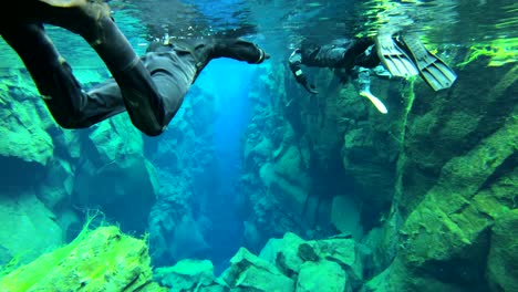 Underwater-diving-snorkeling-footage-following-the-mid-Atlantic-ridge-fissure-in-Thingvellir-Iceland-2