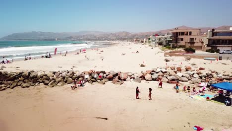 Aerial-over-a-southern-california-beach-scene-during-summertime-3