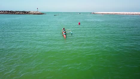 Aerial-over-outrigger-canoes-racing-in-a-rowing-race-on-the-Pacific-ocean-near-Ventura-California