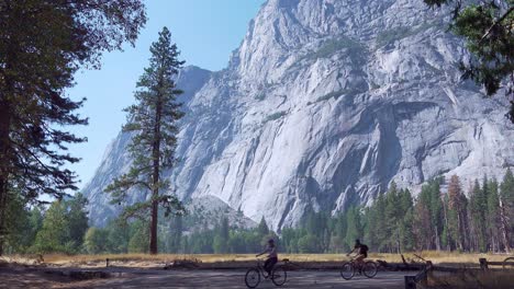 A-group-of-bicyclists-on-a-recreational-ride-in-Yosemite-Valley-on-a-sunny-autumn-day-Yosemite-National-Park-California