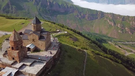 Aerial-Around-The-Gergeti-Monastery-And-Church-Overlooking-The-Caucasus-Mountains-In-The-Republic-Of-Georgia-1