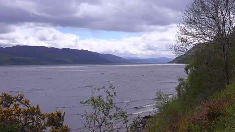 An-establishing-shot-of-Loch-Ness-castle-Scotland-as-a-storm-approaches