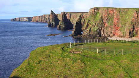 Establishing-shot-of-the-beautiful-Duncansby-Head-sea-stacks-in-Northern-Scotland-1