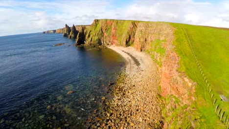 Aerial-shot-of-the-beautiful-Duncansby-Head-sea-stacks-in-Northern-Scotland-1