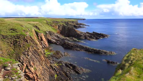 Establishing-time-lapse-shot-of-the-beautiful-rugged-ocean-coast-of-Scotland-or-Ireland