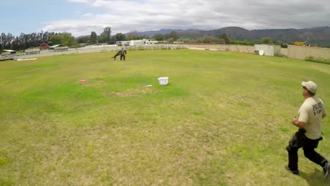 Aerial-view-above-a-K9-dog-in-training-attacking-trainer-3