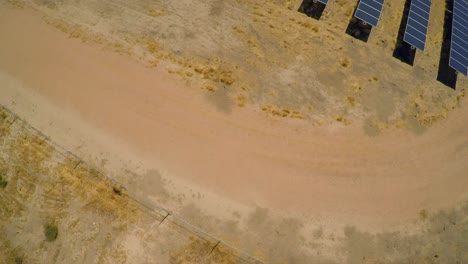 Aerial-over-a-vast-solar-array-farm-in-the-California-desert-4