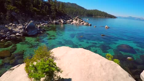 An-vista-aérea-shot-over-beautiful-boulders-and-clear-water-in-Lake-Tahoe-Nevada-1