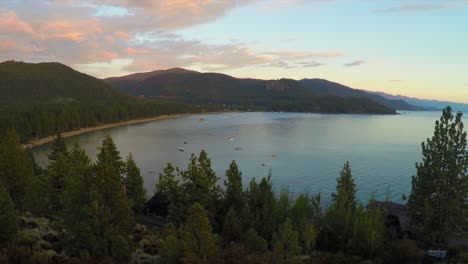 An-aerial-shot-over-a-romantic-couple-looking-out-over-Lake-Tahoe-Nevada-1