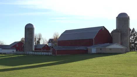 Establishing-shot-of-a-Wisconsin-dairy-farm-as-cows-enter-the-barn