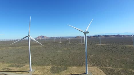 A-high-angle--vista-aérea-over-a-Mojave-desert-wind-farm-as-it-generates-clean-energy-for-California-2