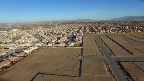 Aerial-over-desert-reveals-housing-tracts-in-the-desert