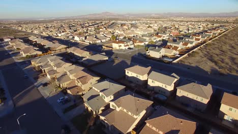 Aerial-over-vast-desert-housing-tracts-suggests-suburban-sprawl-1