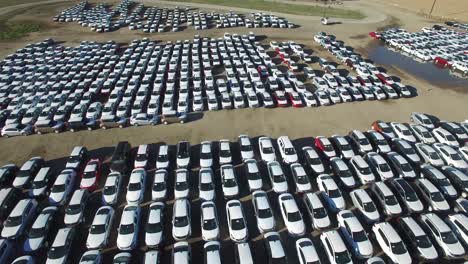 Vista-Aérea-perspective-of-new-import-cars-sitting-in-a-lot-awaiting-distribution-and-sale-1