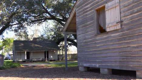 Wooden-cabins-used-by-slaves-still-stand-on-a-plantation-in-the-deep-south-4