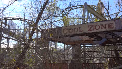 A-decaying-roller-coaster-at-an-abandoned-amusement-park-presents-a-spooky-and-haunted-image