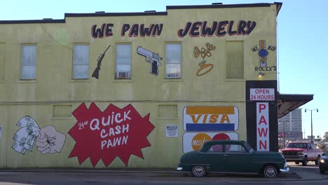 Establishing-shot-of-a-pawn-shop-with-a-sign-saying-we-pawn-jewelry""""-1