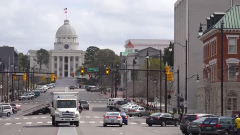 An-establishing-shot-of-downtown-Montgomery-Alabama-with-capitol-building-distant