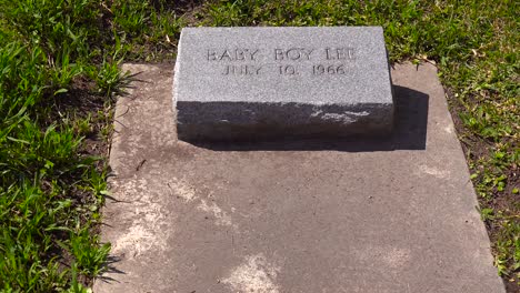 A-simple-gravestone-honors-baby-boy-Jeff""-in-a-cemetery""