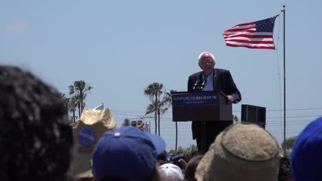 Bernie-Sanders-speaks-in-front-of-a-huge-crowd-at-a-political-rally-about-our-broken-criminal-justice-system