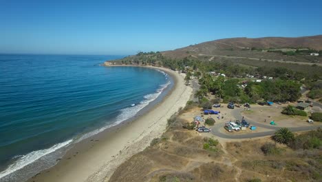 A-beautiful-rising-aerial-shot-along-the-California-coastline-at-Refugio-State-Beach-near-Santa-Barbara