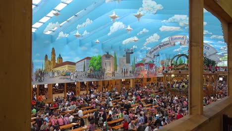 Establishing-shot-of-a-huge-beer-hall-at-Oktoberfest-Germany