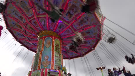 A-rotating-elevated-carnival-ride-gives-folks-a-thrill-at-an-amusement-park-or-fairgrounds