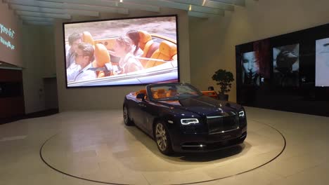 A-luxury-Rolls-Royce-car-sits-in-a-showroom-1