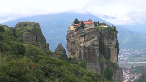 A-cable-car-moves-across-a-chasm-to-a-monastery-in-Meteroa-Greece