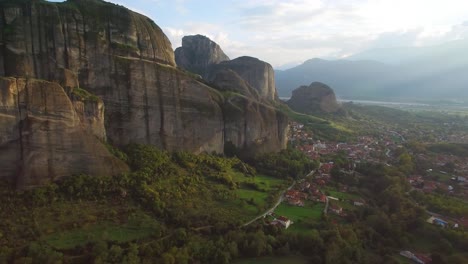 Beautiful-aerial-in-golden-light-over-the-rock-formations-of-Meteora-Greece-1