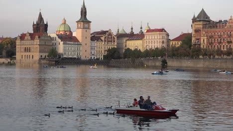 Paddleboats-move-on-the-Vltava-Río-in-Prague-Czech-Republic-1