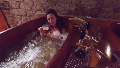 A-woman-in-a-beer-spa-toasts-from-a-tub-of-boiling-beer-2