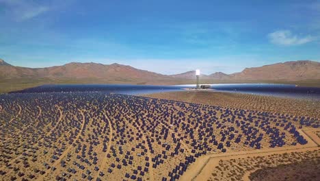 Drone-aerial-over-a-vast-solar-power-generating-facility-at-Primm-Nevada-1