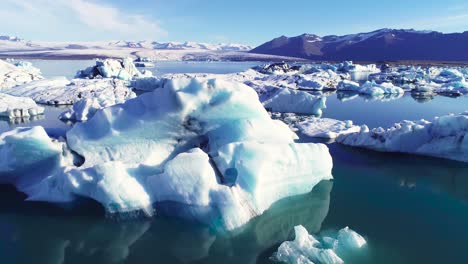 Beautiful-aerial-over-icebergs-in-the-Arctic-Jokulsarlon-glacier-lagoon-in-Iceland-9